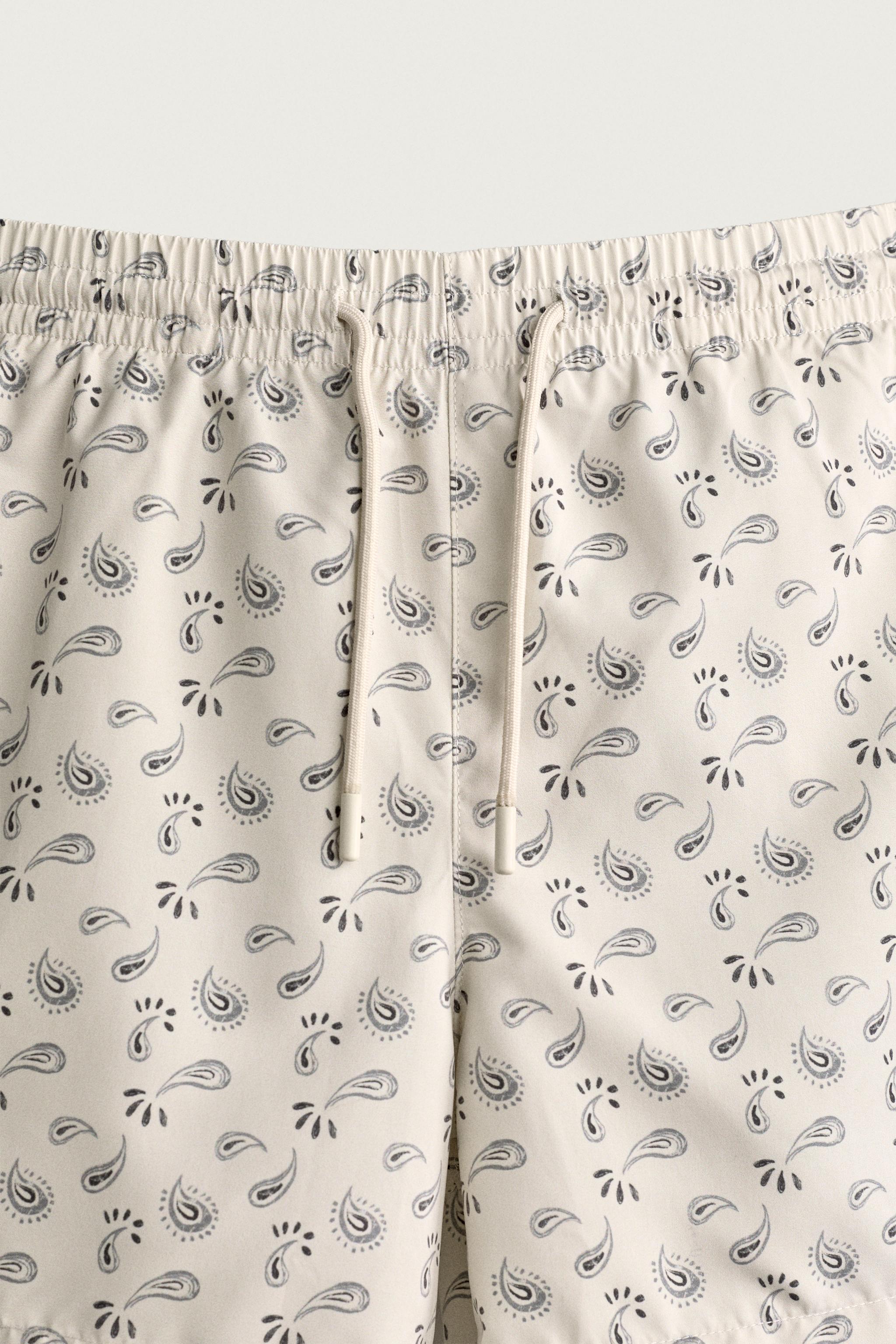 PAISLEY PRINT MID-LENGTH SWIM SHORTS